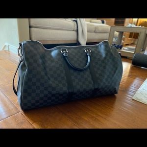 Louis Vuitton duffle, 55